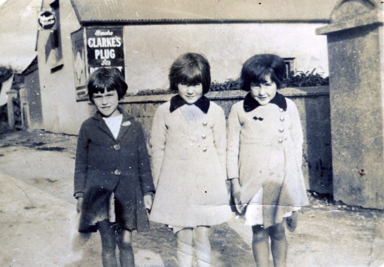 Liz Brennan, Kathleen Lawlor and Eileen Lawlor outside Patrick Murphy’s Shop, c.1937.
