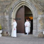 Altar Servers await the arrival of Bishop Ger Nash