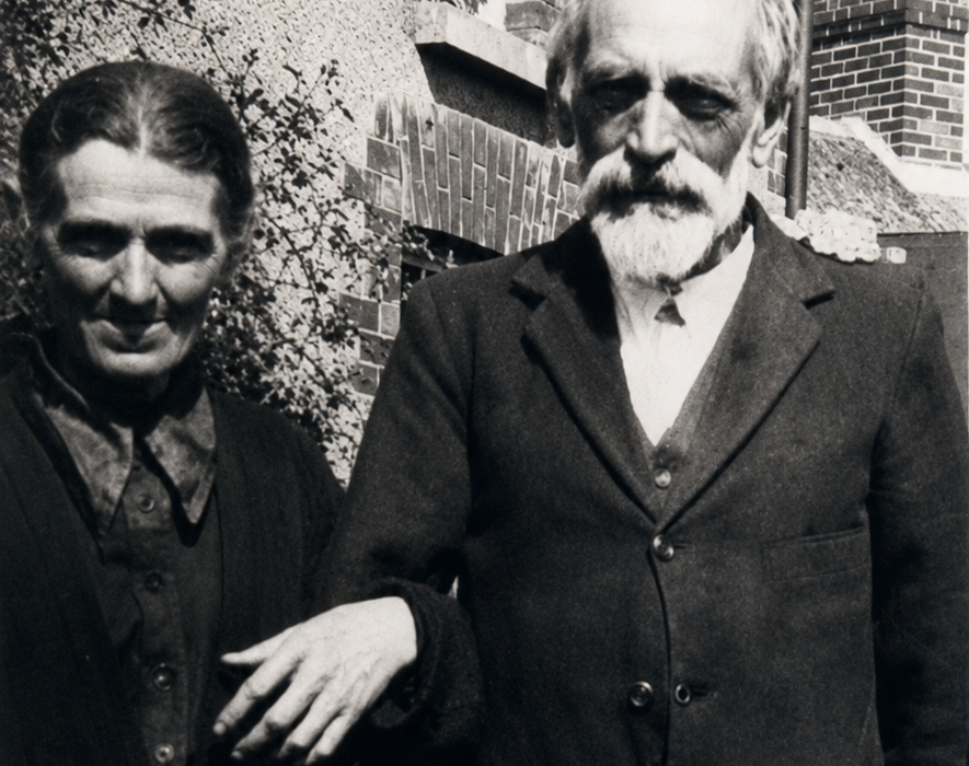 Ellen Brennan and Richard Brennan (1860–1937) outside the Brennan family home and tailor’s shop in Ballyoughter, c.1926.