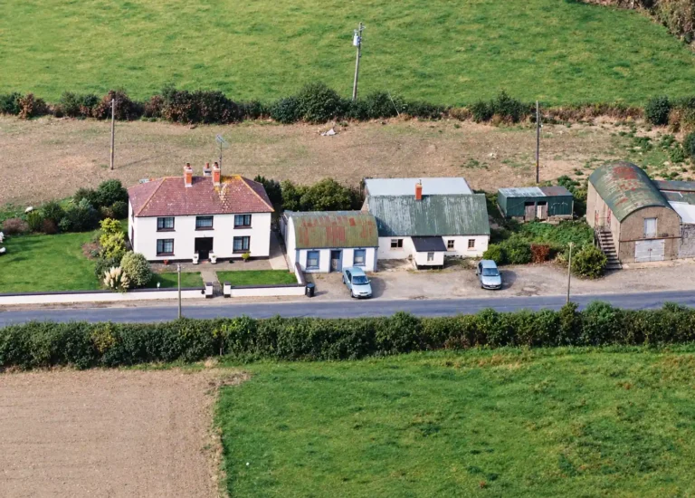 The Carter family houses, former shop, coal store and animal-feed store shortly after the business closed, c.1985.